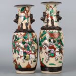 Pair of famille rose knife horse figure vases, 19th century粉彩铁泥花刀马人赏瓶一对 晚清