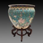 Famille Rose flower and bird fish tank with mahogany base, 20th century粉彩花鸟鱼缸带红木底架 二十世纪