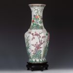 Famille rose hexagonal floral vase and and a red sandalwood base, with Daqing QIanlong Year Made mark粉彩花卉六棱瓶 紫檀底座 大清乾隆年制